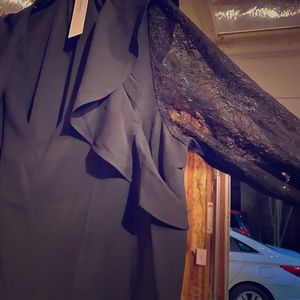 Black knee length dress with lace sleeves